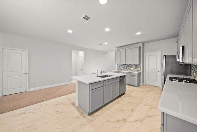6225 Kent Ln, Celina, TX 76227 - kitchen with gray cabinets, appliances with stainless steel finishes, light marble finish floors, and recessed lighting