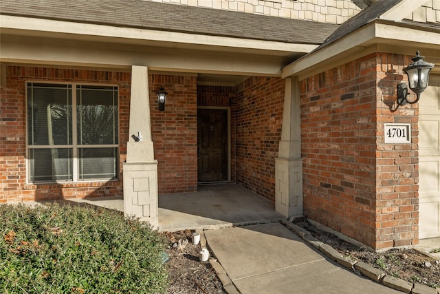 entrance to property with covered porch