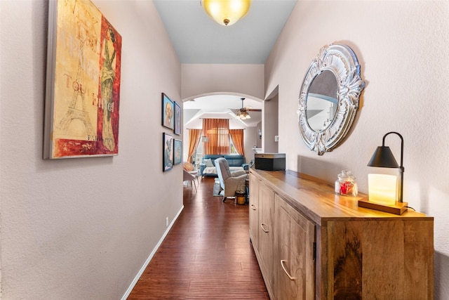 hall with dark hardwood / wood-style flooring