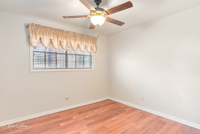 empty room featuring ceiling fan and wood-type flooring