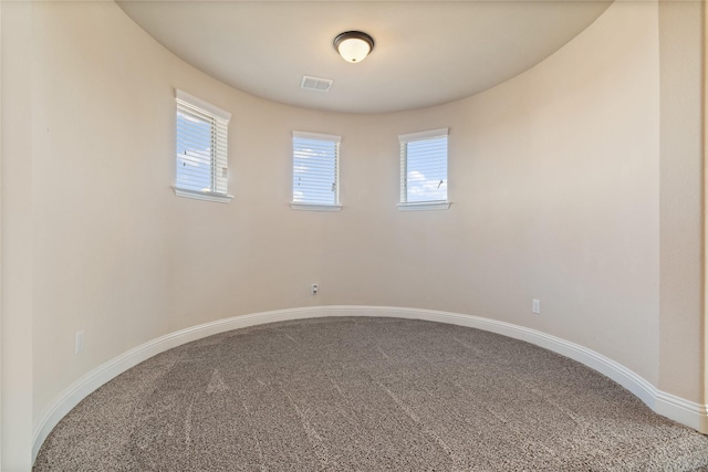 spare room with carpet floors