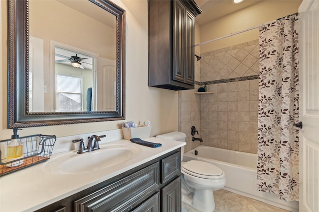 full bathroom with ceiling fan, shower / tub combo, vanity, tile patterned floors, and toilet