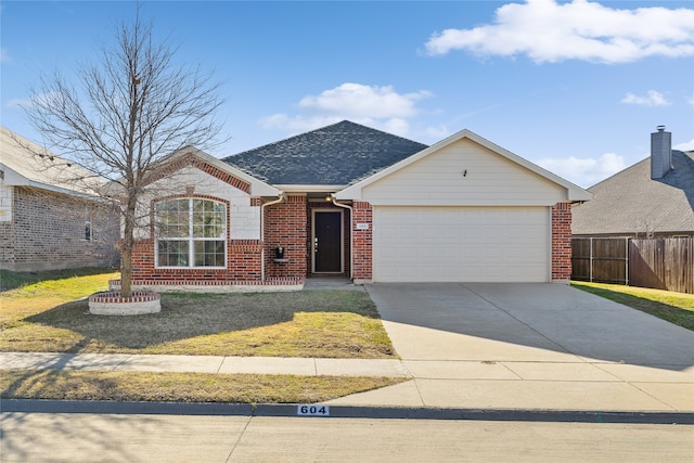 single story home with a garage and a front yard