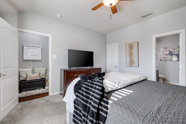 carpeted bedroom featuring ceiling fan and connected bathroom