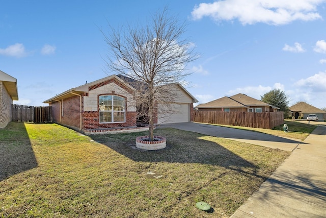 ranch-style house featuring a garage and a front yard