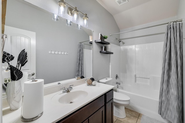 full bathroom with toilet, vaulted ceiling, vanity, shower / bath combo with shower curtain, and tile patterned flooring