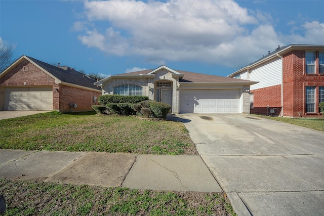 ranch-style house featuring a front lawn and a garage