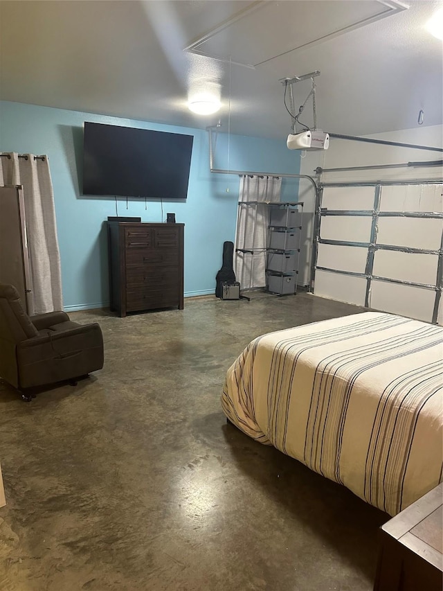 bedroom featuring concrete flooring