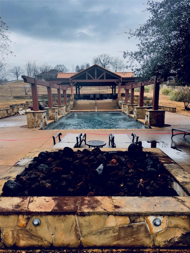 view of swimming pool with a gazebo