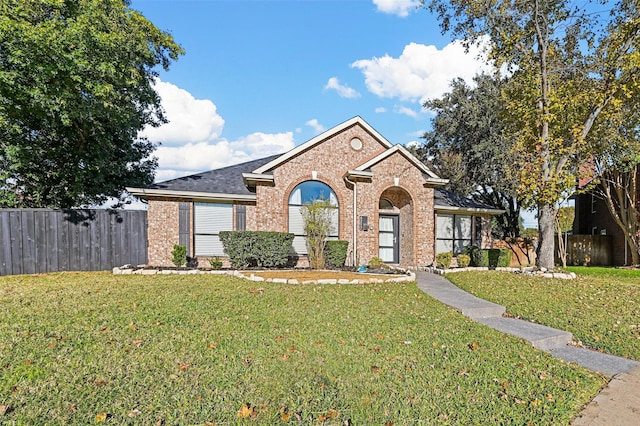 view of front of home with a front yard