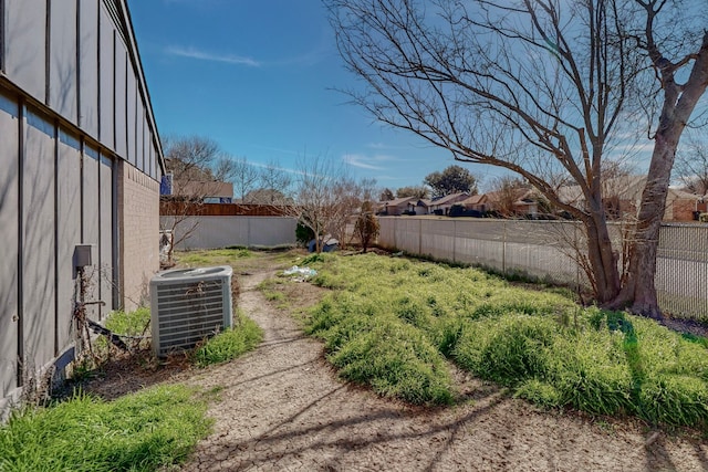 view of yard featuring central AC