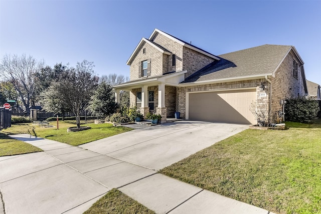 view of front facade with a garage and a front lawn