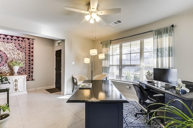 tiled home office with ceiling fan