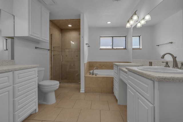 full bathroom with tile patterned flooring, vanity, toilet, and plus walk in shower