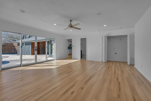 interior space with access to exterior, light wood-type flooring, a closet, and ceiling fan