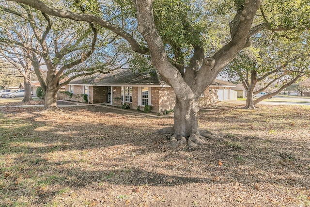 view of front of property featuring a garage