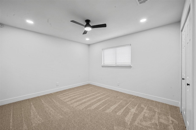 empty room with carpet flooring