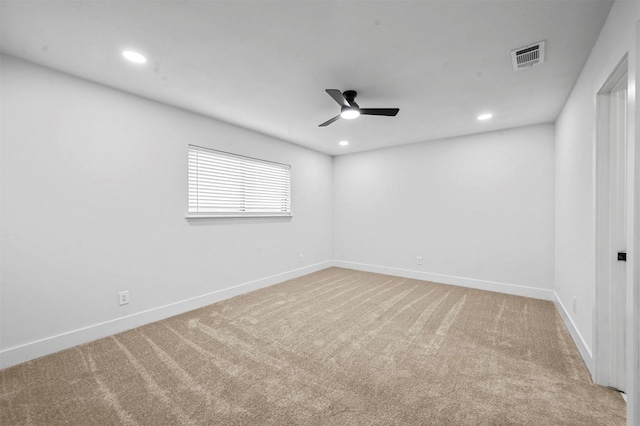 empty room with carpet floors and ceiling fan