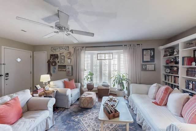 living room with ceiling fan