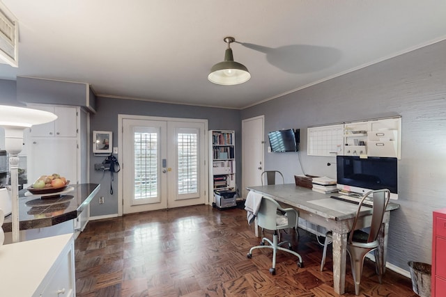 office space featuring dark parquet floors, ornamental molding, and french doors