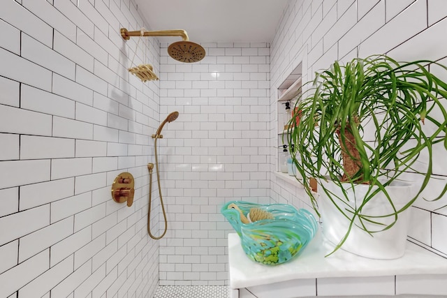 bathroom with a tile shower