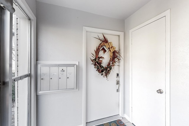 entrance foyer featuring mail boxes