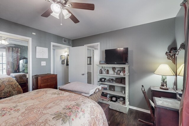 bedroom featuring ceiling fan and dark hardwood / wood-style flooring