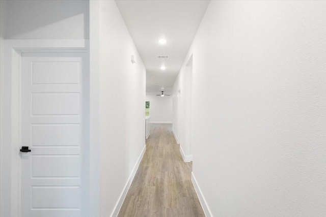 hall featuring light hardwood / wood-style flooring