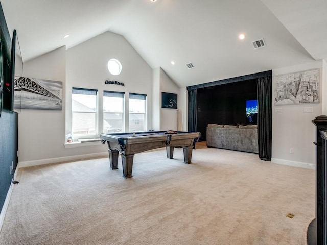 game room with pool table, lofted ceiling, and light carpet