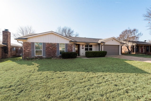 single story home featuring a front yard and a garage