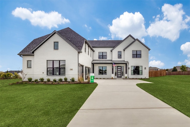 modern farmhouse with a front yard