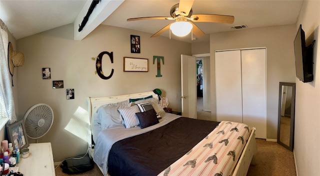 bedroom featuring ceiling fan, carpet floors, and a closet