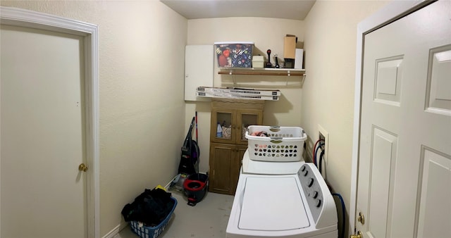 laundry room featuring washer and clothes dryer