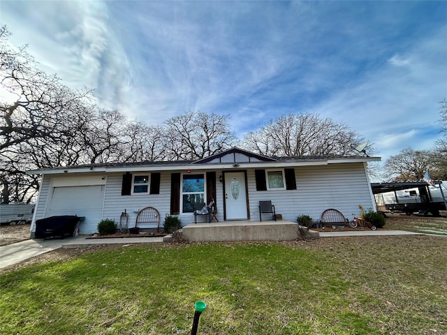 single story home with a porch, a front yard, concrete driveway, and a garage