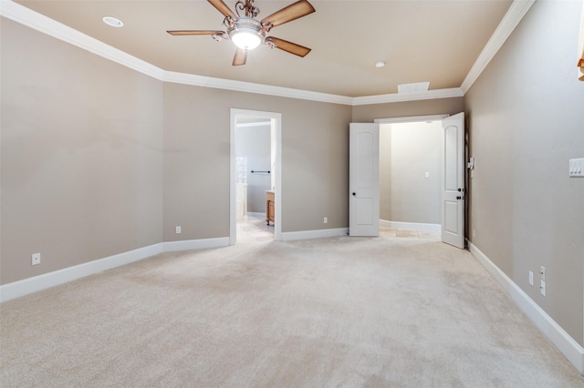 empty room with crown molding, light colored carpet, and ceiling fan