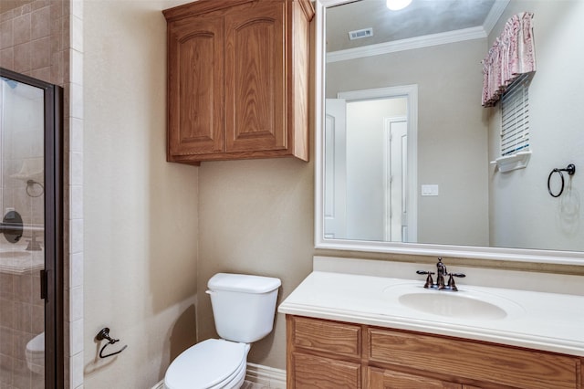 bathroom featuring walk in shower, ornamental molding, toilet, and vanity