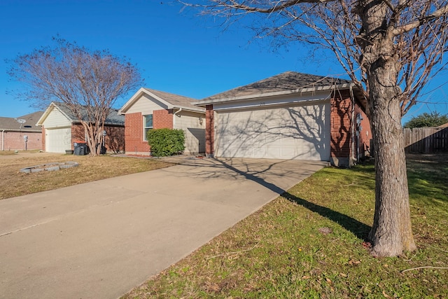 ranch-style home featuring a garage and a front lawn