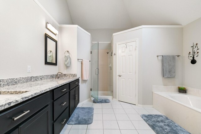 full bathroom with vanity, toilet, tile patterned floors, and shower / bath combo with shower curtain