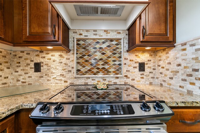 kitchen featuring stainless steel electric stove, wooden counters, custom exhaust hood, sink, and white dishwasher