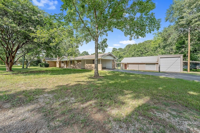 ranch-style house with a garage and a front yard