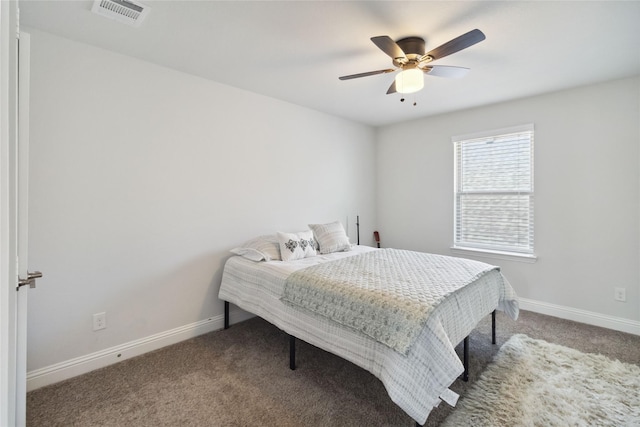 bedroom with ceiling fan and carpet floors