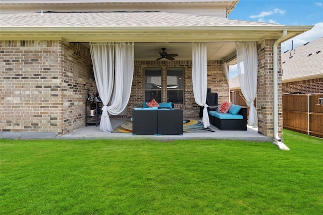 exterior space with outdoor lounge area and ceiling fan