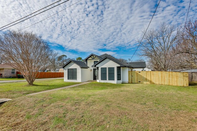 view of front of home with a front yard