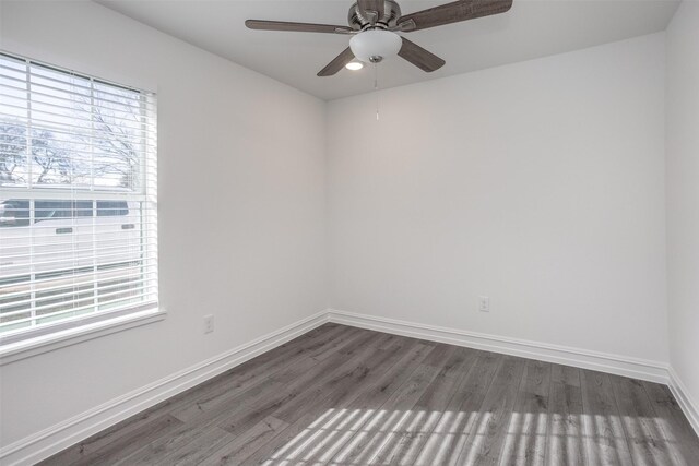 unfurnished room with wood-type flooring, a wealth of natural light, and ceiling fan