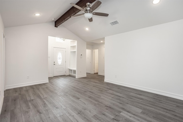 unfurnished living room with hardwood / wood-style flooring, ceiling fan, and lofted ceiling with beams