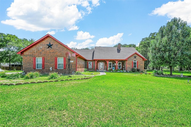 view of front of home with a front yard