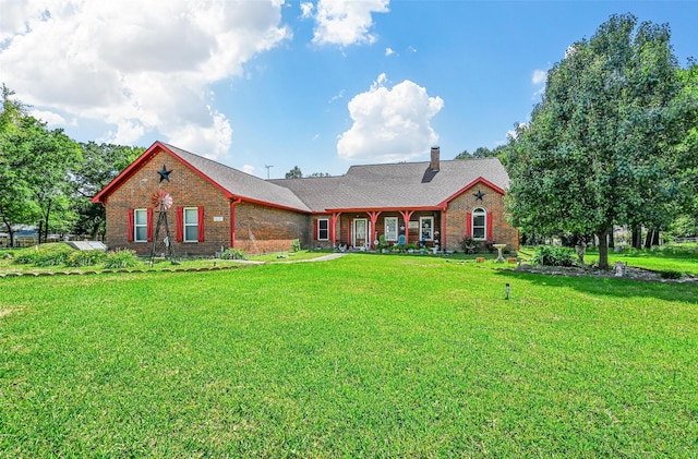 view of front of home with a front yard