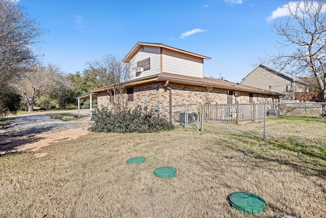 view of property exterior with a yard