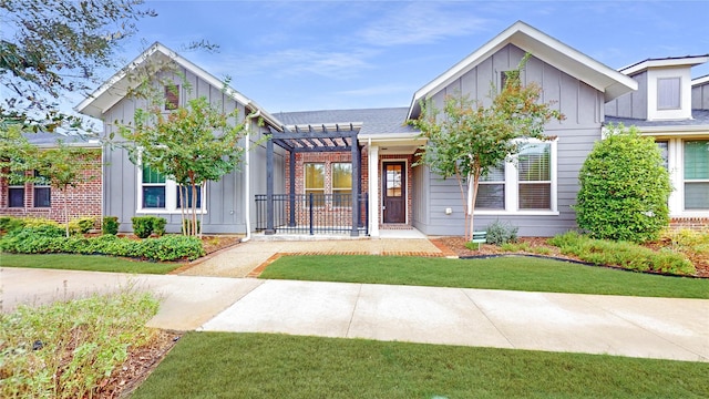 view of front of house with a pergola