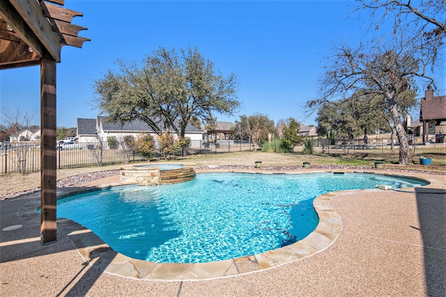 view of swimming pool featuring an in ground hot tub and a patio area